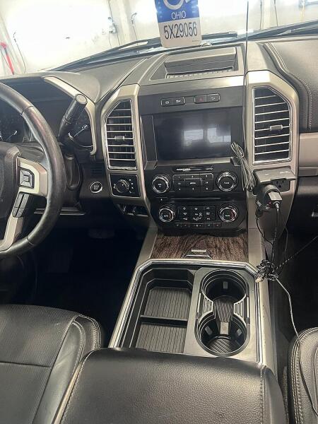 The center console of the Ford F350 after it has been cleaned and detailed by Andy's Autowash.