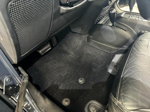 No pet hair between the seat and door frame after the interior detailing service by Andy's Autowash & Detailing.