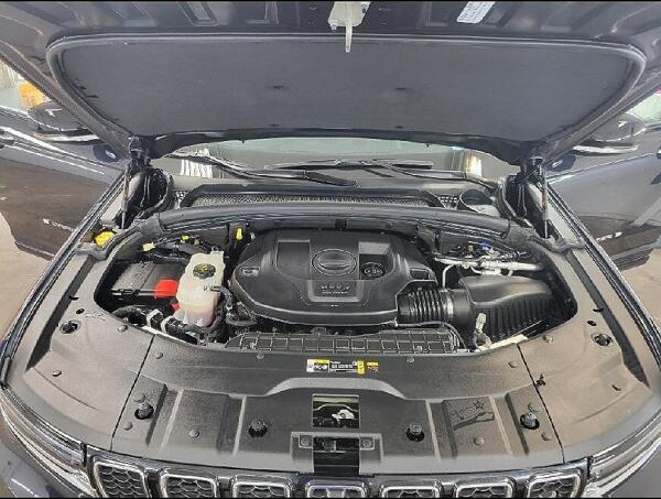A closer view of under the hood after it had the engine cleaning by Andy's Autowash. Showing the clean nooks and crannies.