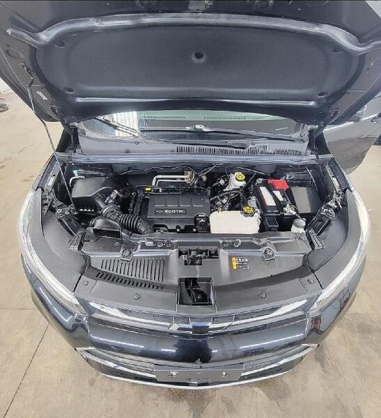 Under the hood of a vehicle. Showing how clean it looks after the engine cleaning service by Andy's Autowash in North Olmsted, Ohio. 