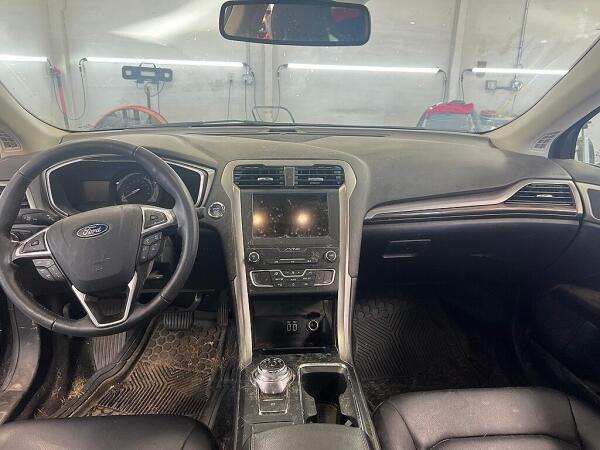 The inside of the cab of  a Ford vehicle before it was cleaned by Andy's Autowash in North Olmsted, Ohio.